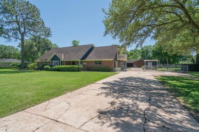 Situated on nearly an acre in the quiet Garden Acres community in east Pearland, this sprawling lot offers a gated driveway leading amidst towering pines and sprawling oak trees to this one of a kind property with a single car garage and a covered carport.