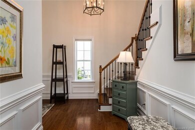 Wood floors throughout main level. Wrought iron ba
