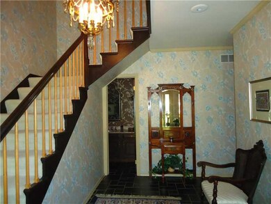 Entry/Foyer. Gracious warm and welcoming center ha