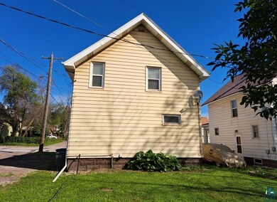 View of home's exterior featuring a lawn