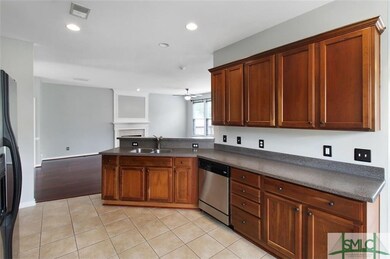 Kitchen with ceramic tile flooring