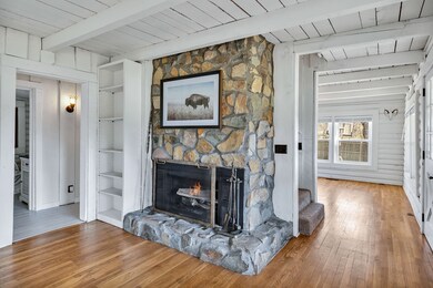 Gorgeous stone wood burning fireplace