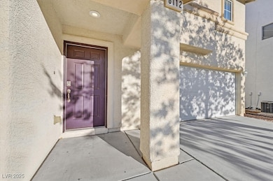 Doorway to property with central air condition uni