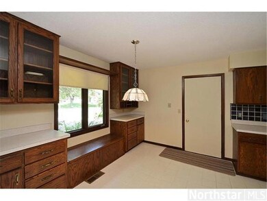 Informal Dining area has custom built-ins, includi