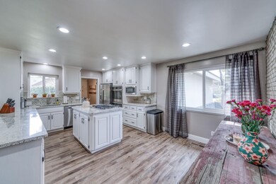 The kitchen is light and bright with new appliance