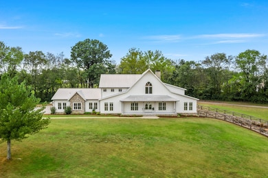 The 5-bedroom home spans over 7,500 SF plus an additional 1,761 SF with the partially finished basement.