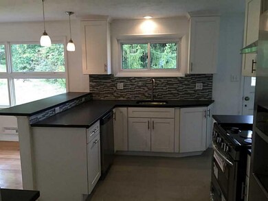 Kitchen. Granite counter & disposal