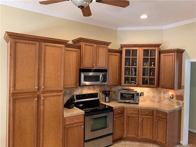 Kitchen with Stainless Appliances, Tile Backsplash