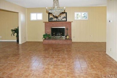 Huge Formal Dining Room with Brick Fireplace