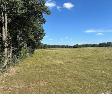 View of woods featuring a rural view