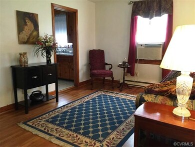 Family room with newly refinished hardwood floors