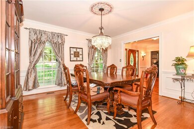 Elegant dining room comfortably accommodates furnishings