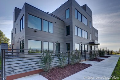 Large private patio surrounds Unit 103