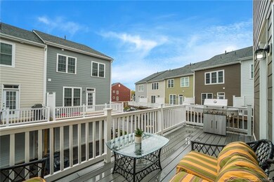 Back deck off of kitchen has trex decking and pvc railing.  This home features 3 great outdoor spaces for relaxing and entertaining.