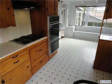 Lots of knotty pine cabinets in this true country 