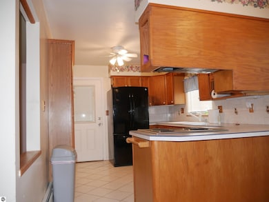 458 Morrison St, West Branch, MI 48661 - photo 2