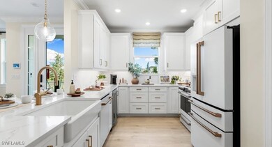 15339 Giardino Dr unit 11-104, Naples, FL 34114 - photo 7