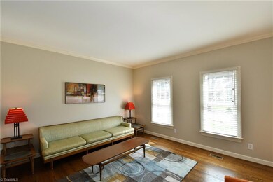 Living room and den connect via dbl opening