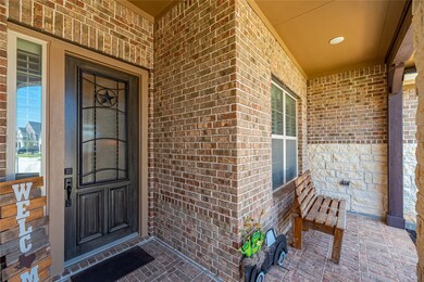 It's no secret, who doesn't love a beautiful porch to spend an afternoon on. This is a vibrant place to relax with a cold beverage, watching the sun go down on a warm afternoon. All of the flowers boast beautiful colors looking out into the front yard as you watch the kids play.
