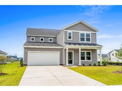 View of front of home featuring a front lawn and a