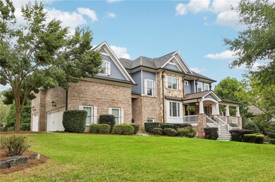 View of front of property with a garage and a fron