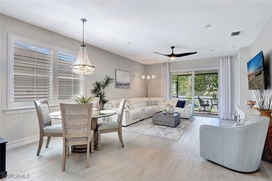 Dining room featuring ceiling fan with notable cha