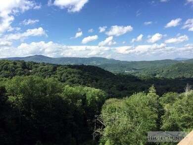 Walk to Slopes: Walk down steps to the trail to th