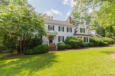The lot is over a half-acre of mature trees and pl