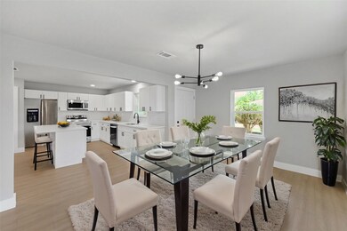 Virtually Staged. Large spacious dinings room off