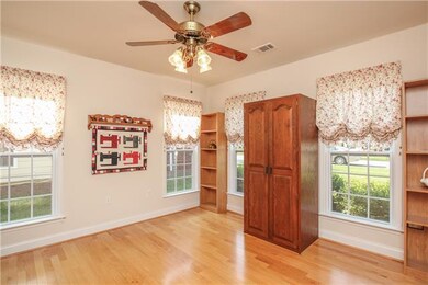 The office/study, located off the entryway, has bu