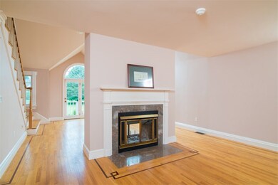 DINING ROOM WITH FIREPLACE, NOTE HARDWOOD FLOORS T