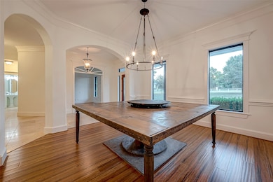 Formal dining with stunning hardwood floors