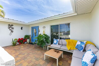 View of patio / terrace with an outdoor living spa