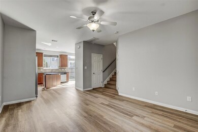 Unfurnished living room featuring light wood fini