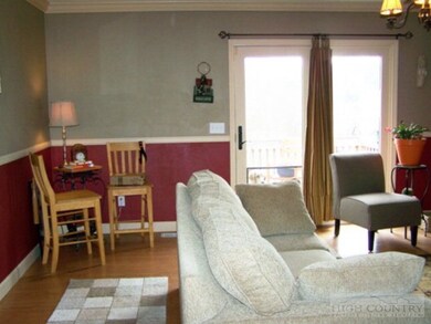 Living Room: French door to access deck.