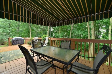 The large QUALITY-MADE awning provides 3 season protection and cool. Plenty big for your patio table and other guest chairs too!