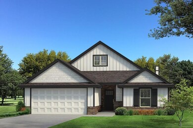 View of front of property with a garage and a fron
