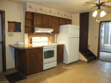 Fully applianced kitchen.
