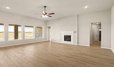 Impressive great room with cozy fireplace (*Photo not of actual home and used for illustration purposes only.)