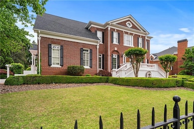 View of front facade featuring brick siding and a 