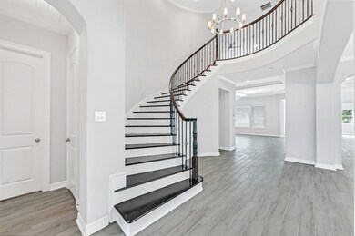 Grand stairway over looking the entry!