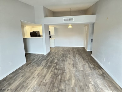 Unfurnished dining area featuring baseboards, high