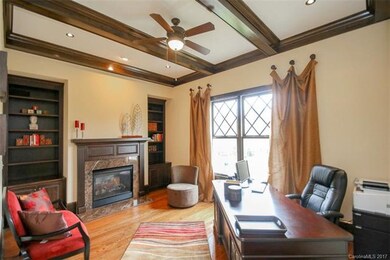 This home boasts 3 fireplaces! Yes, there is even 