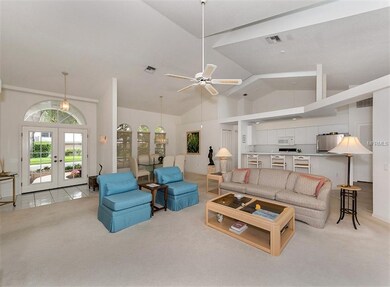 Foyer, living room, dining room and kitchen