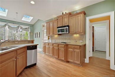 Looking out past Breakfast Room with Skylights. On