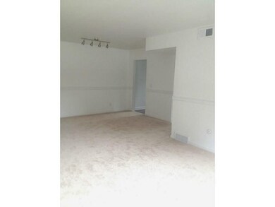 Living Room. The neutral living room/dining room c