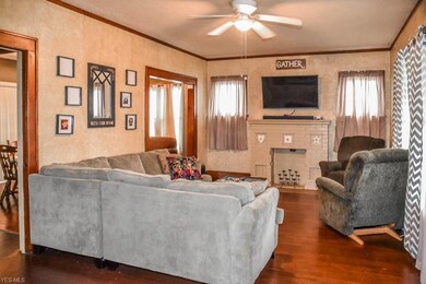 Living room with wood flooring.