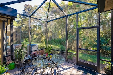 Unfurnished sunroom featuring outdoor dining area