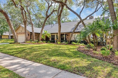 Front elevation-Tree covered yard