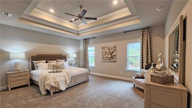 Photos of a previously built home and are representational only. Colors and finishes may vary.